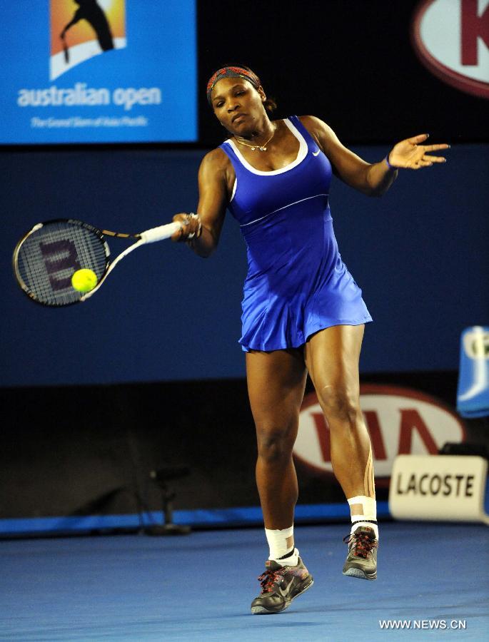 Serena Williams of the U.S hits a return to Tamira Paszek of Austria during their women's singles tennis match at the 2012 Australian Open tennis tournament in Melbourne, Australia on Jan. 17, 2012. Serena Williams won 2-0. 