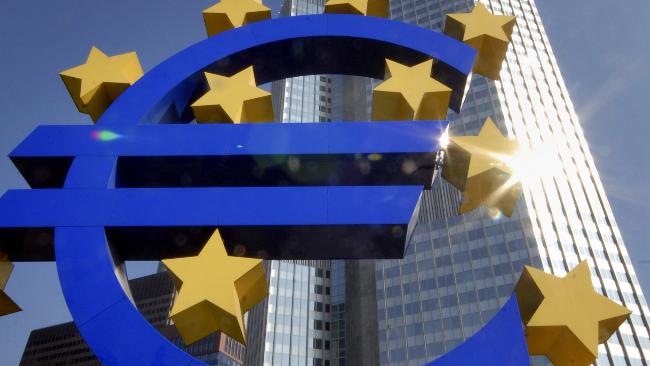 A sculpture of the euro symbol in front of the European Central Bank's headquarters in Frankfurt, Germany. The euro is expected to decline this year against the dollar and yuan after hitting record lows this week.[File photo]