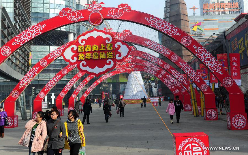 Spring Festival decorations are seen on a street of Shenyang, capital of northeast China's Liaoning province, Jan. 19, 2012. With the coming of the Spring Festival, the festal atmosphere has been spread all over Shenyang. 