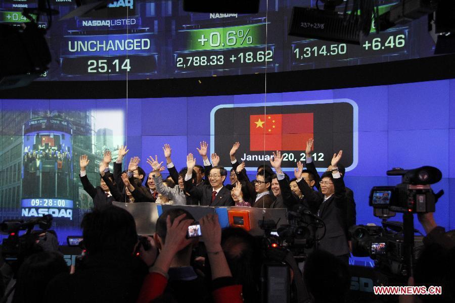 A bell-ring ceremony is held in the Nasdaq Exchange to mark the Chinese New Year, the Year of Dragon, in New York, the United States on Jan. 20, 2012.