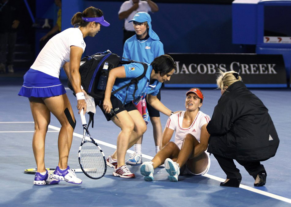 At the Australian Open in Melbourne on Jan. 20, 2012, China's Li Na was leading 2-0 in the first set and on her serve in the third game when Spaniard Anabel Medina Garrigues sprained her ankle after returning a ball. 