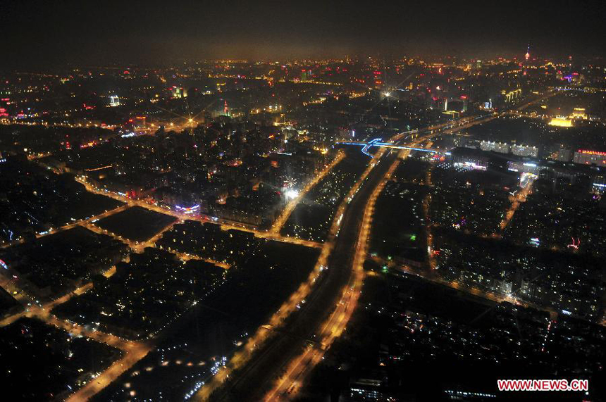 Photo taken on Jan. 22, 2012 shows the bird's-eye view of the buildings in Beijing, capital of China, on the eve before Chinese lunar Year of Dragon. 