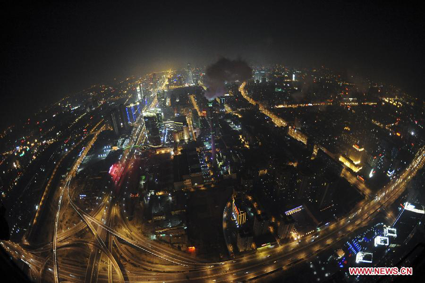 Photo taken on Jan. 22, 2012 shows the bird's-eye view of the buildings in Beijing, capital of China, on the eve before Chinese lunar Year of Dragon. 