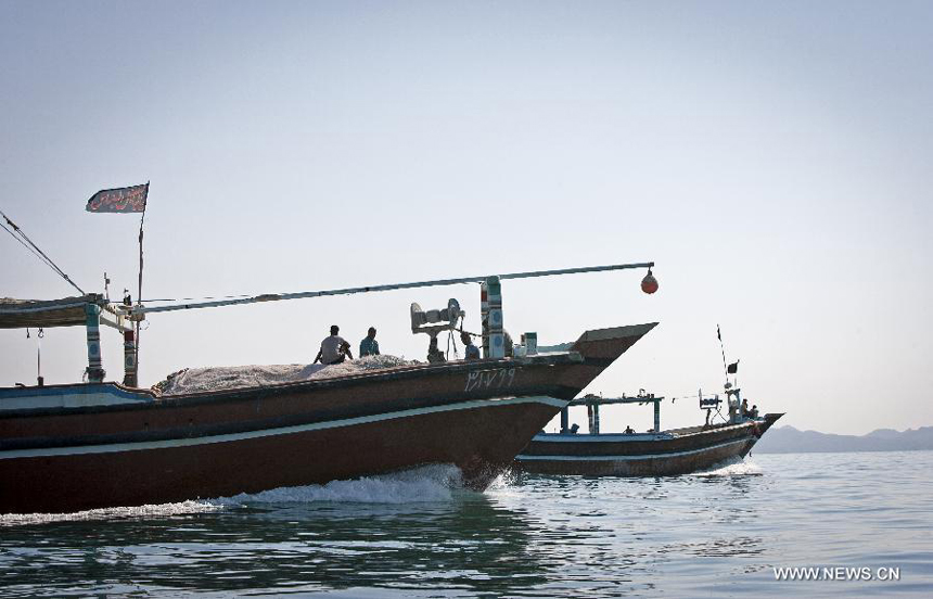 File Photo taken on Dec. 24, 2011 shows boats on the Persian Gulf near the Qeshm Island in south Iran. A total of 17 people died after a passenger boat sank off the Iranian coast on sunday, according to Fars news agency.