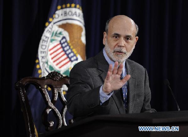 U.S. Federal Reserve Chairman Ben Bernanke attends a press conference after a Federal Open Market Committee (FOMC) meeting in Washington D.C., capital of the United States, Jan. 25, 2012. [Xinhua/Zhang Jun]
