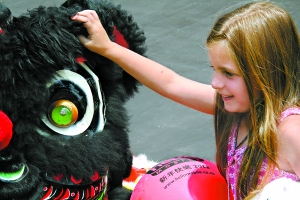 A Chinese Temple Fair is held in Johannesburg, South Africa, to celebrate the Year of the Dragon. 