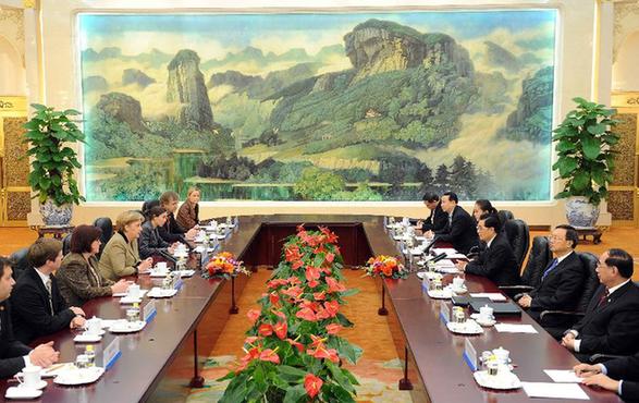 Chinese President Hu Jintao (3rd R) meets with German Chancellor Angela Merkel (4th L) at the Great Hall of the People in Beijing, capital of China, Feb. 3, 2012. [Li Tao/Xinhua] 