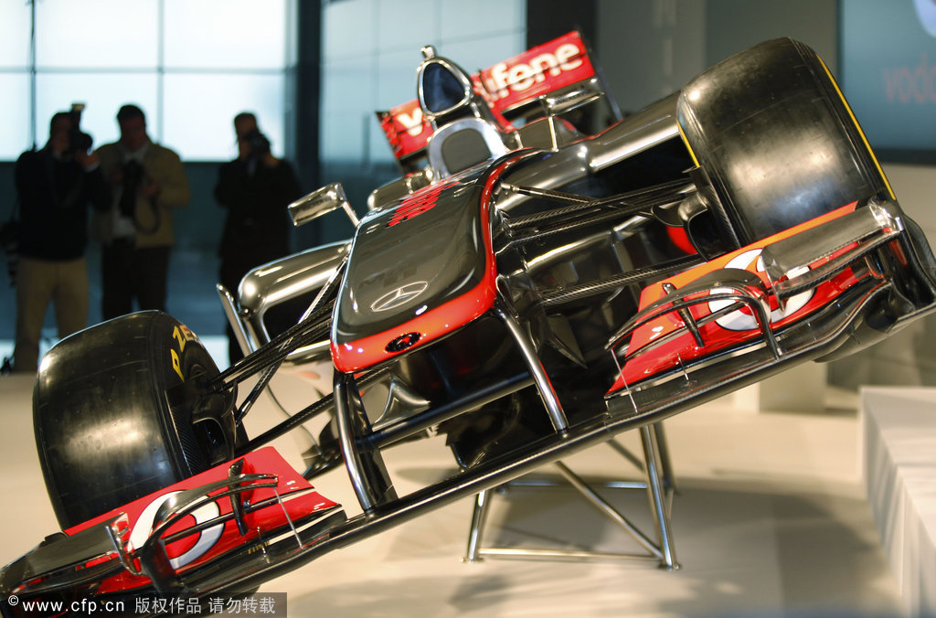 A view of the MP4-27, the newly-unveiled Vodafone Mclaren Mercedes Formula One car for the 2012 season, during a photo-op prior to the launch near woking, England on Wednesday, Feb. 1, 2012.