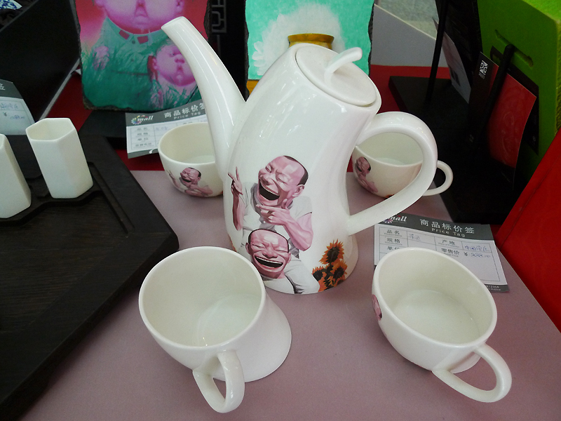 Abnormal-shaped tea wares are on display in an indoor temple fair in the Golden Resources Shopping Mall located in the northwest part of Beijing during the Spring Festival 2012, where visitors can enjoy the charm of the traditional Chinese arts and the delicacy of local snacks. [By Xu Lin / China.org.cn]