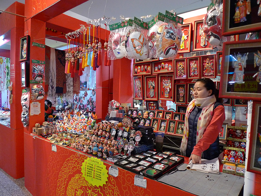 Facial make-ups and masks are on display in an indoor temple fair in the Golden Resources Shopping Mall located in the northwest part of Beijing during the Spring Festival 2012, where visitors can enjoy the charm of the traditional Chinese arts and the delicacy of local snacks. [By Xu Lin / China.org.cn]