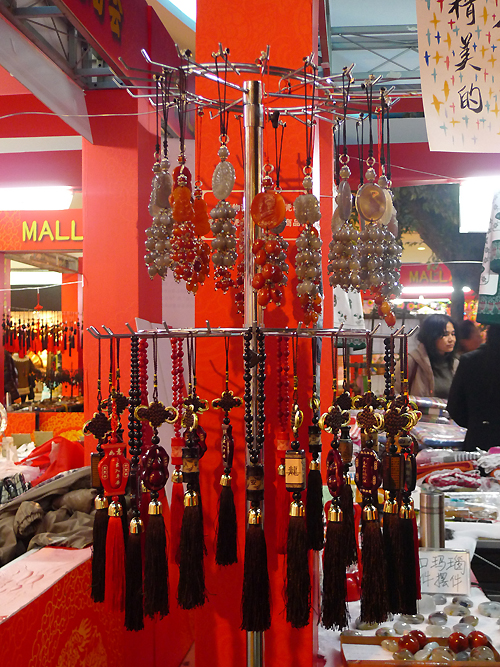 Chinese knots are on display in an indoor temple fair in the Golden Resources Shopping Mall located in the northwest part of Beijing during the Spring Festival 2012, where visitors can enjoy the charm of the traditional Chinese arts and the delicacy of local snacks. [By Xu Lin / China.org.cn]