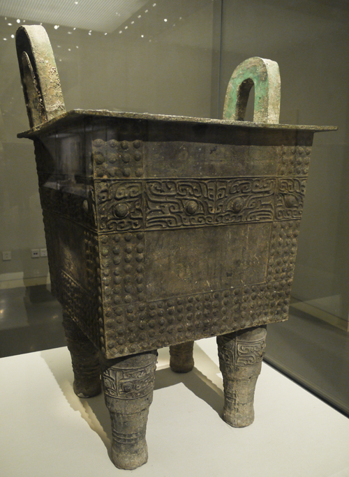 Bronze Ding (food container), Early Shang Dynasty (c. 16th-14th centuries BC), unearthed at Duling, Zhengzhou, Henan Province, 1974. It is exhibited in the section of Exhibition on life, production in Xia, Shang and Western Zhou Dynasties, an exhibition of Ancient China in the National Museum of China. [Photo by Xu Lin / China.org.cn]