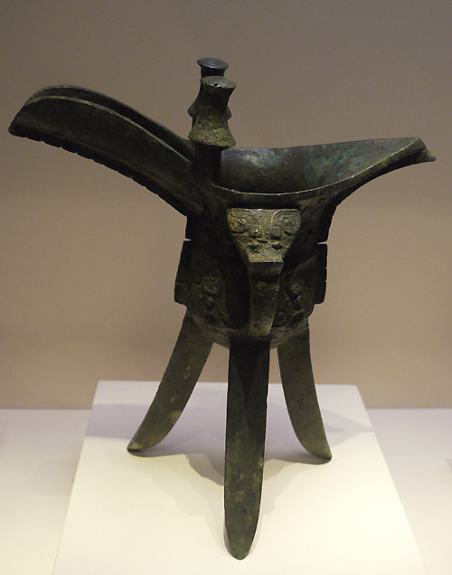 Bronze Jue (wine vessel), Shang Dynasty (c. 16th-11th centuries BC), King Wu Ding's reign, unearthed from tomb of Fu Hao at Yinxu, Anyang, Henan Province, 1976. It is exhibited in the section of Exhibition on life, production in Xia, Shang and Western Zhou Dynasties, an exhibition of Ancient China in the National Museum of China. [Photo by Xu Lin / China.org.cn]