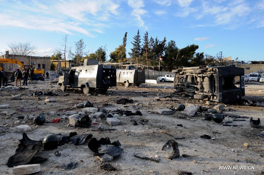 Photo taken on Feb. 10, 2012 shows the explosion site of a law-enforcement force in Hanano area in Aleppo, northern Syria. Twin deadly blasts caused by car bombs hit two sites of Syrian government forces in northern Aleppo province Friday, leaving 28 people killed and other 235 injured, said Syria's official media, blaming the attacks on armed groups backed by foreign plot.