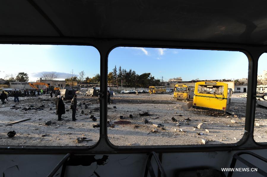 Photo taken on Feb. 10, 2012 shows the explosion site of a law-enforcement force in Hanano area in Aleppo, northern Syria. Twin deadly blasts caused by car bombs hit two sites of Syrian government forces in northern Aleppo province Friday, leaving 28 people killed and other 235 injured, said Syria's official media, blaming the attacks on armed groups backed by foreign plot.