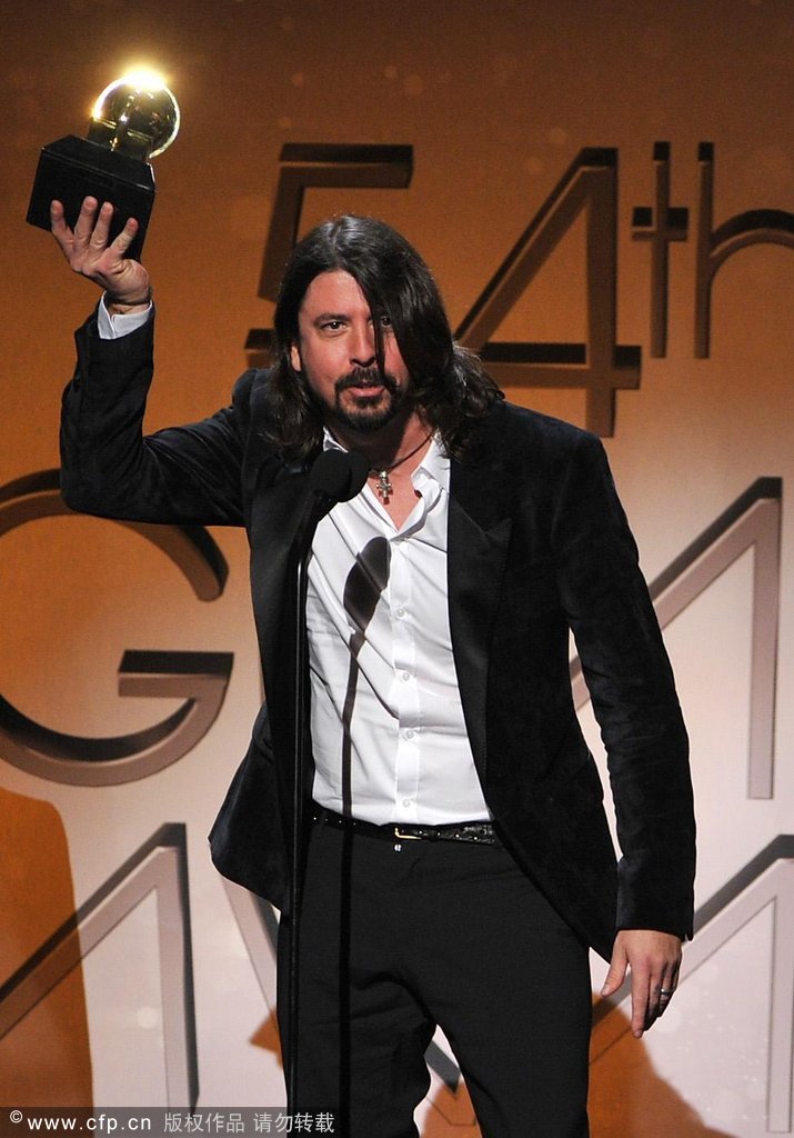 Musician Dave Grohl of the Foo Fighers accepts the award for Best Album for 'Wasting Light' onstage at the 54th annual Grammy Awards held at Staples Center on Feb. 12, 2012 in Los Angeles, California. 