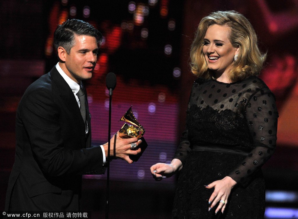 Producer Paul Epworth and singer Adele accept the award for 'Song of the Year' onstage at the 54th Annual Grammy Awards held at Staples Center on Feb.12, 2012 in Los Angeles, California.