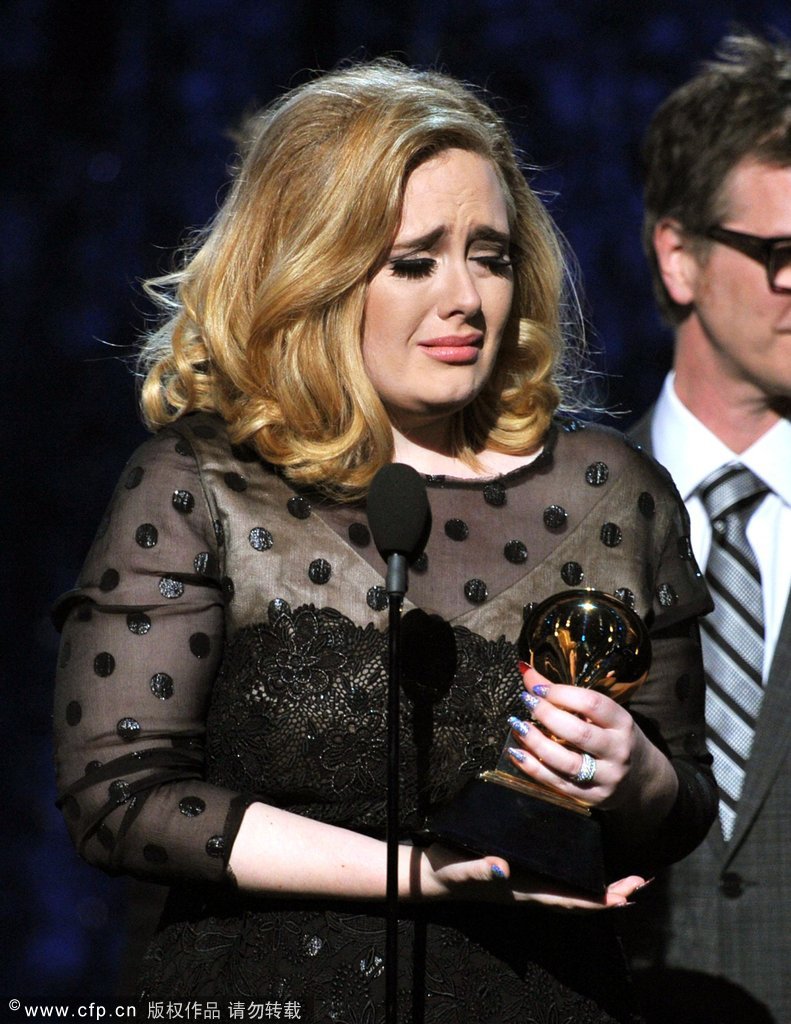 Singer Adele accepts the Album of the Year Award for '21'onstage at the 54th Annual Grammy Awards held at Staples Center on Feb. 12, 2012 in Los Angeles, California.