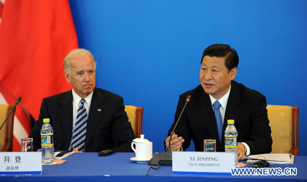 Chinese Vice President Xi Jinping (R) and United States Vice President Joe Biden attend the China-US Business Dialogue aimed at enhancing the bilateral trade and economic ties, in Beijing, capital of China, Aug. 19, 2011. [Zhang Duo/Xinhua] 