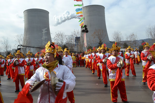 7. Cymbal dancers keep the rhythm going at the She Huo Jie festival in Zuoquan, Shanxi Province, Feb. 8, 2012.