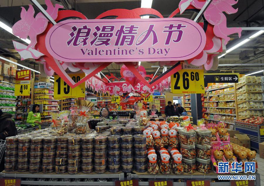 A chocolate section in a supermarket in Zhengzhou, Henan Province, is decorated especially for the Valentine’s Day on Feb. 11, 2012. 