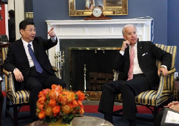 Chinese Vice President Xi Jinping (L) holds talks with his U.S. counterpart Joe Biden at the White House in Washington, the United States, Feb. 14, 2012. [Lan Hongguang/Xinhua]