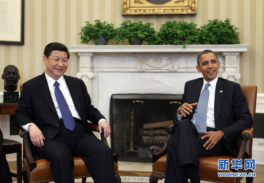 China's Vice President Xi Jinping (L) meets with US President Barack Obama at the White House in Washington, February 14, 2012.