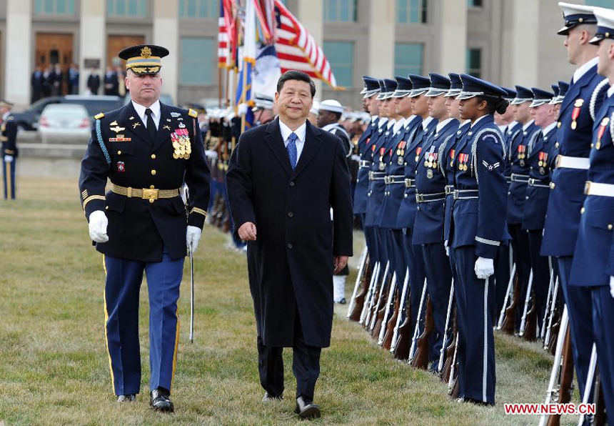 Chinese Vice President Xi Jinping (2nd, L) reviews a guard of honor during a welcoming ceremony given by U.S. Secretary of Defense Leon E. Panetta at the Pentagon in Washington, the United States, Feb. 14, 2012.