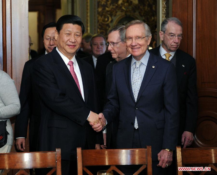 Chinese Vice President Xi Jinping (front L) meets with U.S. Senate Majority Leader Harry Reid at the Capitol Hill in Washington, the United States, Feb. 15, 2012. [Liu Jiansheng/Xinhua] 