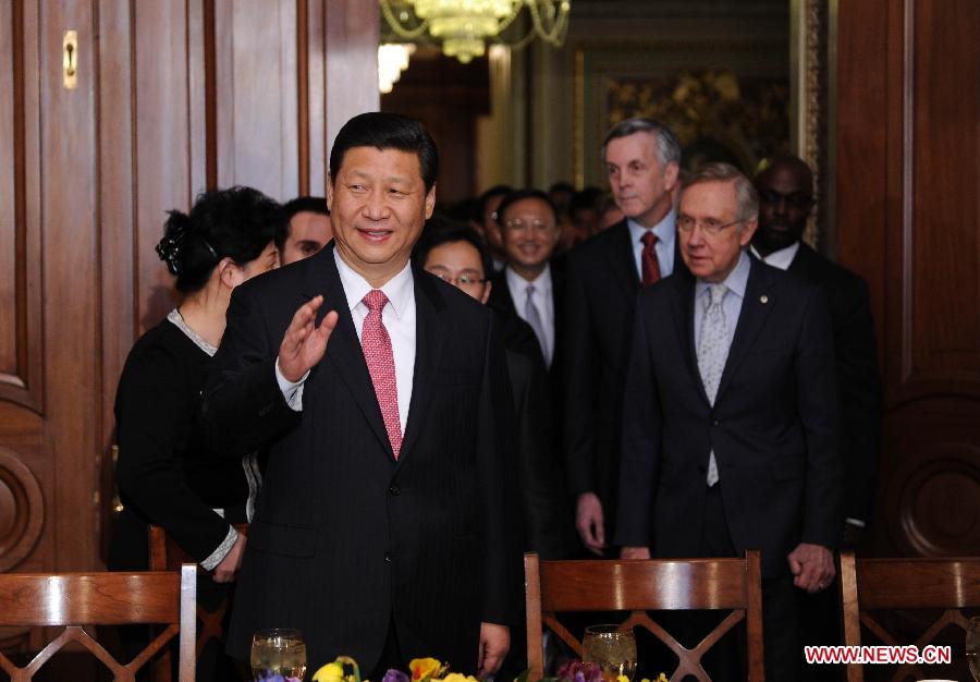 Chinese Vice President Xi Jinping (front L) meets with U.S. Senate Majority Leader Harry Reid at the Capitol Hill in Washington, the United States, Feb. 15, 2012. [Liu Jiansheng/Xinhua] 