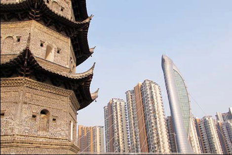 Ancient towers and skyscrapers stand side-by-side in Wuhu, Anhui province. Wang Kaihao / China Daily