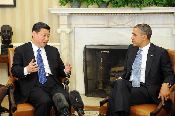 Chinese Vice President Xi Jinping (L) meets with U.S. President Barack Obama at the White House in Washington, the United States, Feb. 14, 2012. (Xinhua/Xie Huanchi)