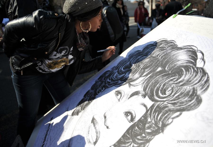 Fans mourn Whitney Houston near New Jersey funeral