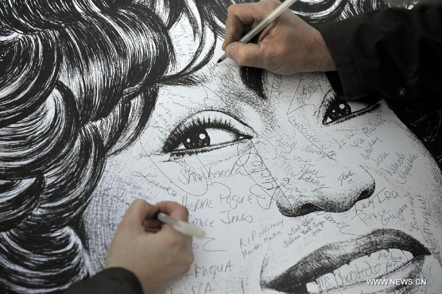 Fans mourn Whitney Houston near New Jersey funeral