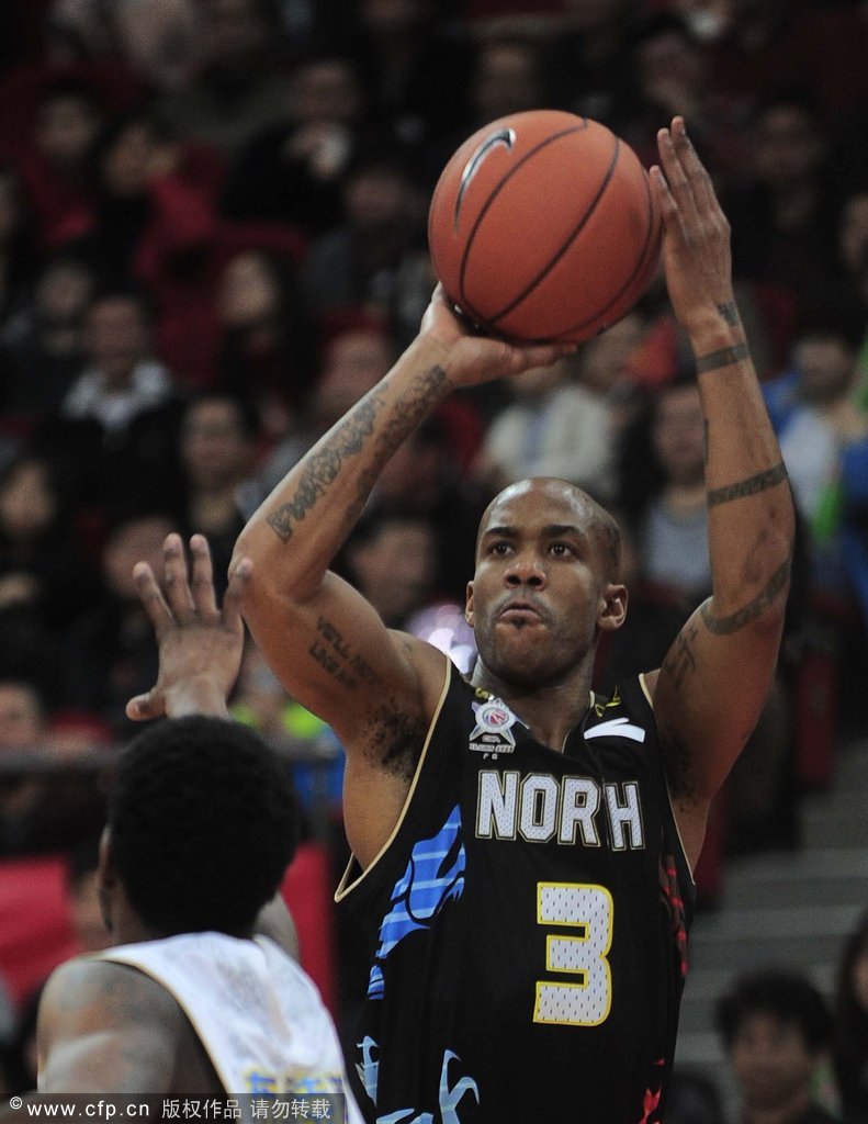 Stephon Marbury shoots in front of Aaron Brooks during the first half of the CBA All-Star Game on February 19, 2012.