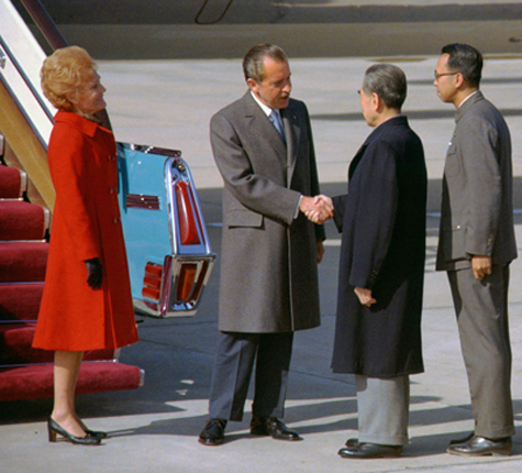 President Richard Nixon and Premier Zhou Enlai shake hands in Beijing in February 1972. 