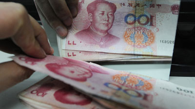 London is expected to grow into a major international trading center for RMB. [File photo]