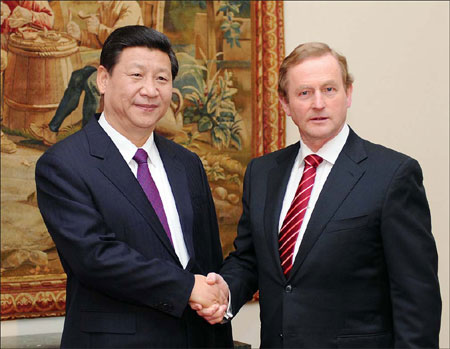 Vice-President Xi Jinping meets Irish Prime Minister Enda Kenny in Dublin on Sunday. [Xinhua]