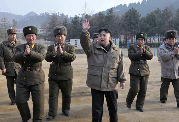 Kim Jong-un (center), supreme commander of the Korean People's Army, waves as he inspects KPA Unit 169 in this picture released by the Democratic People's Republic of Korea's KCNA in Pyongyang on Sunday. [Photo/Agencies] 