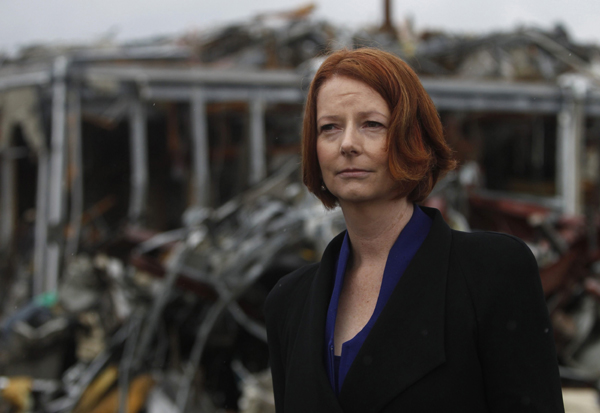 Australia's Prime Minister Julia Gillard visits Minamisanriku town in Miyagi prefecture, after the area was devastated by the March 11 earthquake and tsunami, April 23, 2011. [Xinhua]