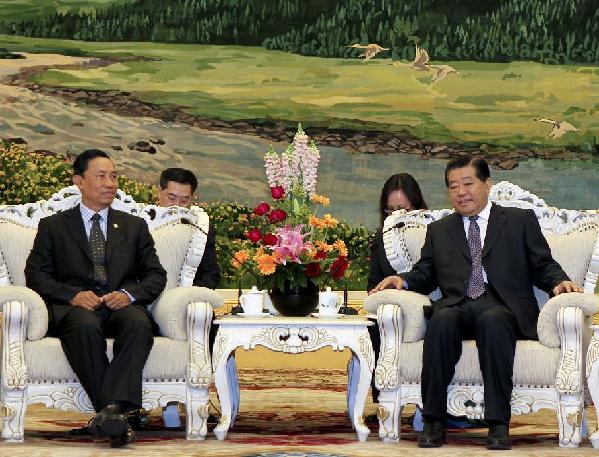 Jia Qinglin (R), chairman of the National Committee of the Chinese People's Political Consultative Conference (CPPCC), meets with Myanmar's Speaker of the House of Representatives Thura U Shwe Mann in Beijing, capital of China, Feb. 23, 2012. [Ding Lin/Xinhua]