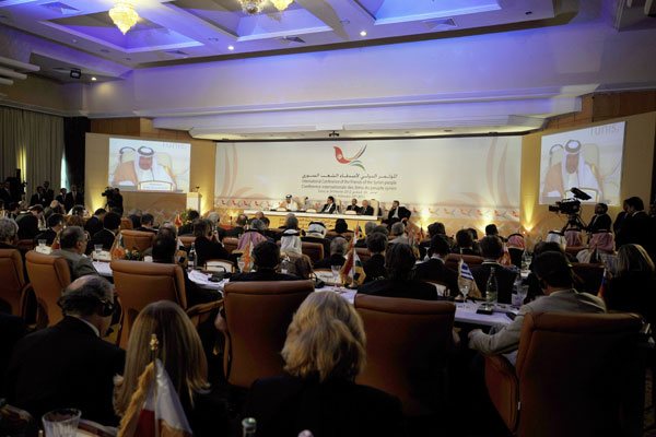 Delegates and officials from over 60 countries take part in the 'Friends of Syria' conference in Tunis, on February 24, 2012, where diplomats discuss the crisis in Syria, with a focus on aid and a political resolution of the violent conflict which has killed over 7000 people since the beginning of pro-democracy demonstrations a year ago. [AFP/Xinhua]