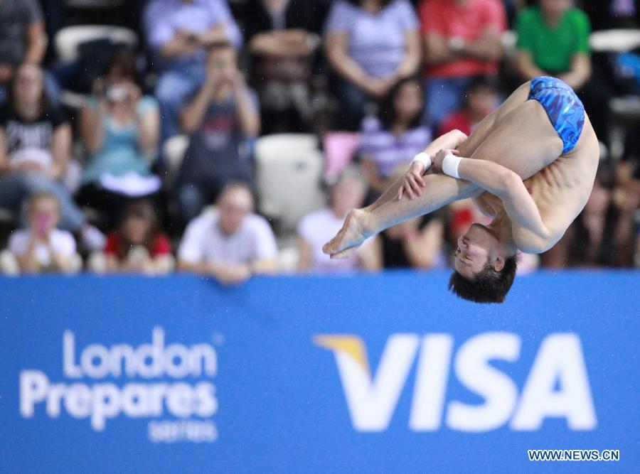 Qiu Bo of China competes during the Men's 10m Platform Final at the FINA Diving World Cup at the Olympic Aquatics Centre in London, Britain, Feb. 25, 2012. Qiu won the gold medal with 574.90 points. [Xinhua]