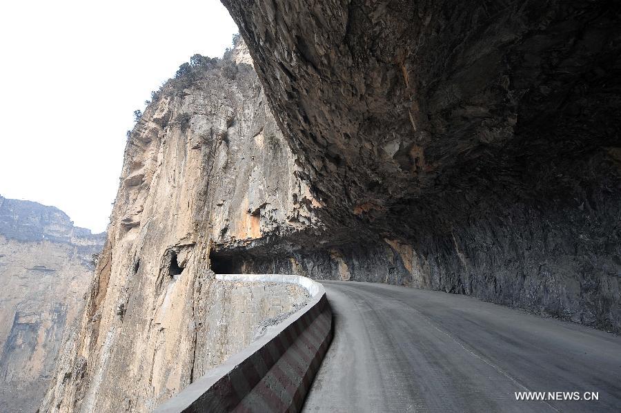 Photo taken on Feb. 24, 2012 shows the 'heavenly road' along the waist of the Taihang Mountains in Pingshun County, north China's Shanxi Province. The 1,526-meter-long road, which spirals up along the 1,100-meter-high Taihang Mountains is a shortcut to the Jingdi Village at the mountain foot. Local villagers spent 15 years to build the road and they call it 'heavenly road.'