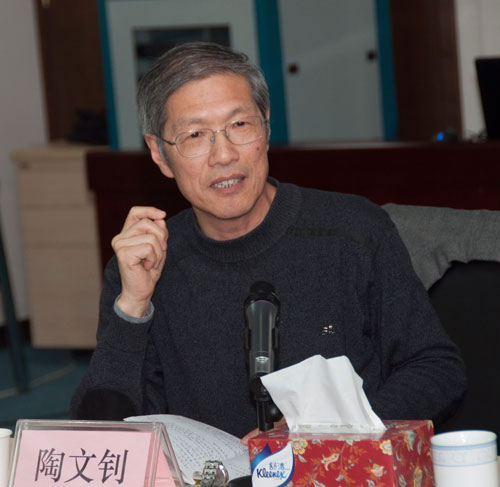 Tao Wenzhao delivers a speech at the seminar organized by China.org.cn on Feb, 23. [Photo: Chen Boyuan/China.org.cn] 