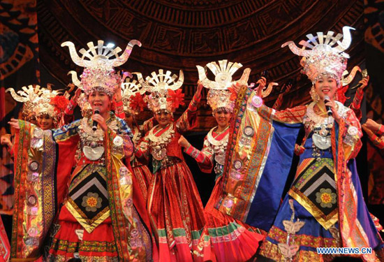 Dancers from the folk song and dance company of southwest China's Guizhou Province perform at Bruce Mansion Center, in Auckland, New Zealand, Feb. 29, 2012. Wind of Colorful Guizhou, a large song and dance peformance with rich folk customs and local favor, was performed here on Wednesday. (Xinhua/Huang Xingwei) Dancers from the folk song and dance company of southwest China's Guizhou Province perform at Bruce Mansion Center, in Auckland, New Zealand, Feb. 29, 2012. Wind of Colorful Guizhou, a large song and dance peformance with rich folk customs and local favor, was performed here on Wednesday. (Xinhua/Huang Xingwei)