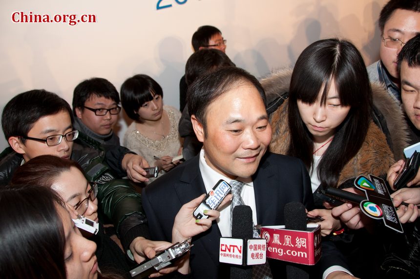 Li Shufu, chairman and chief executive of Geely Automobile Holding Company Ltd., and also member of Chinese People&apos;s Political Consultative Conference (CPPCC) meets the press on Friday, March 2, 2012, one day before the CPPCC formally starts on Saturday. 