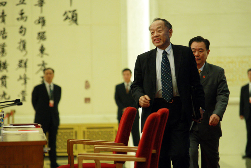 The Fifth Session of the 11th National People's Congress (NPC) holds a press conference Sunday in the Great Hall of the People on the schedule of the session and issues related to the work of the NPC ahead of the session's opening on March 5. Li Zhaoxing, spokesman for the Fifth Session of the 11th NPC, answers questions from journalists during the press conference. 