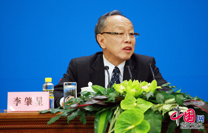 The Fifth Session of the 11th National People's Congress (NPC) holds a press conference Sunday in the Great Hall of the People on the schedule of the session and issues related to the work of the NPC ahead of the session's opening on March 5. Li Zhaoxing, spokesman for the Fifth Session of the 11th NPC, answers questions from journalists during the press conference. 