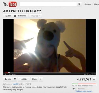 This image made from video posted on YouTube shows a girl with a koala hat asking 'Am I pretty or ugly?' The video has more than 4 million views. [Agencies]
